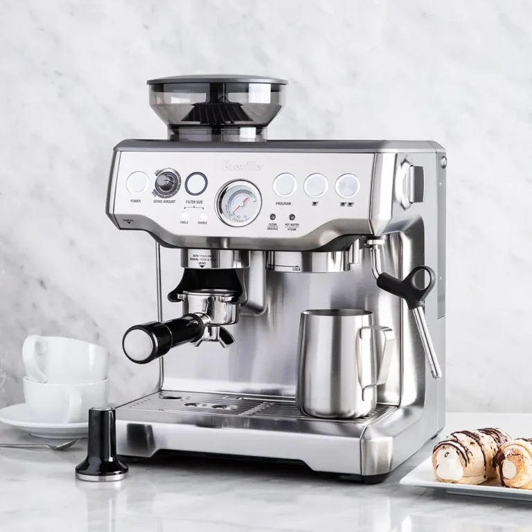 Breville Barista Express espresso machine with built-in grinder and steam wand.